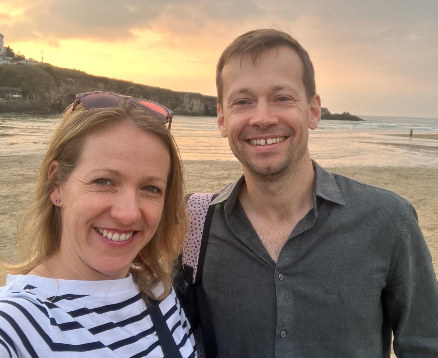Tom and Sonia on the beach at sunset